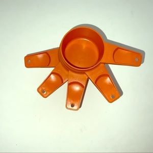 Tupperware vintage measuring cups orange